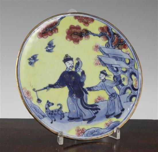 A Chinese yellow ground underglaze blue and copper red opium dish, Kangxi period, 17cm